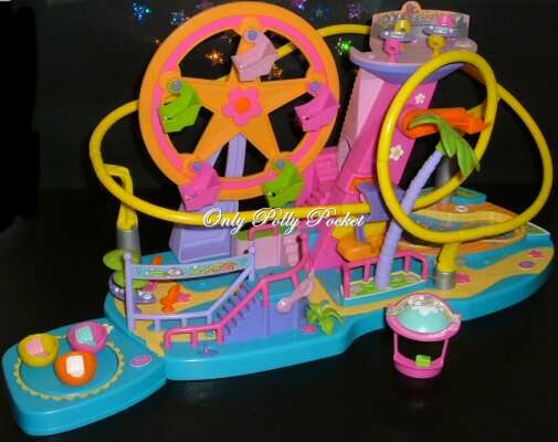 Polly World PollyWorld Amusement Park with roller coaster, ferris wheel tea cup ride and sky cafe